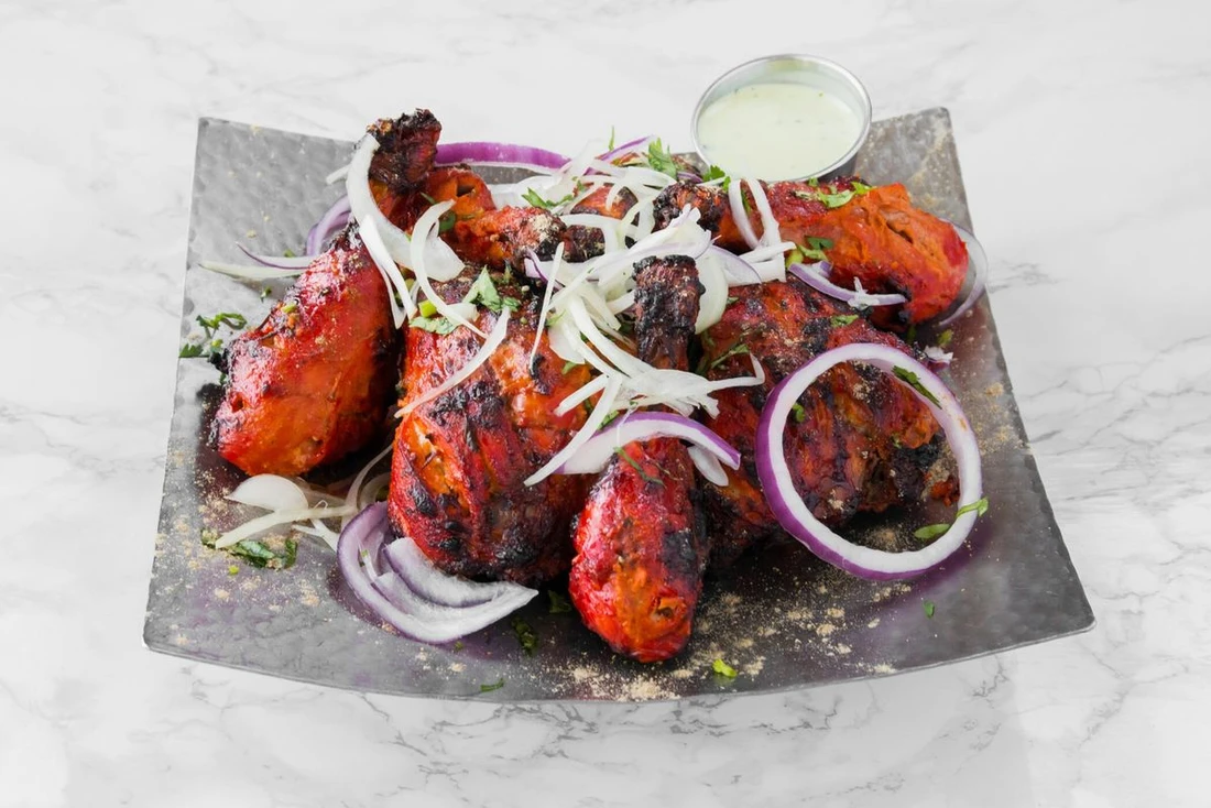 Tandoori chicken and Indian curry at Holy Spice East Indian Cuisine Winnipeg